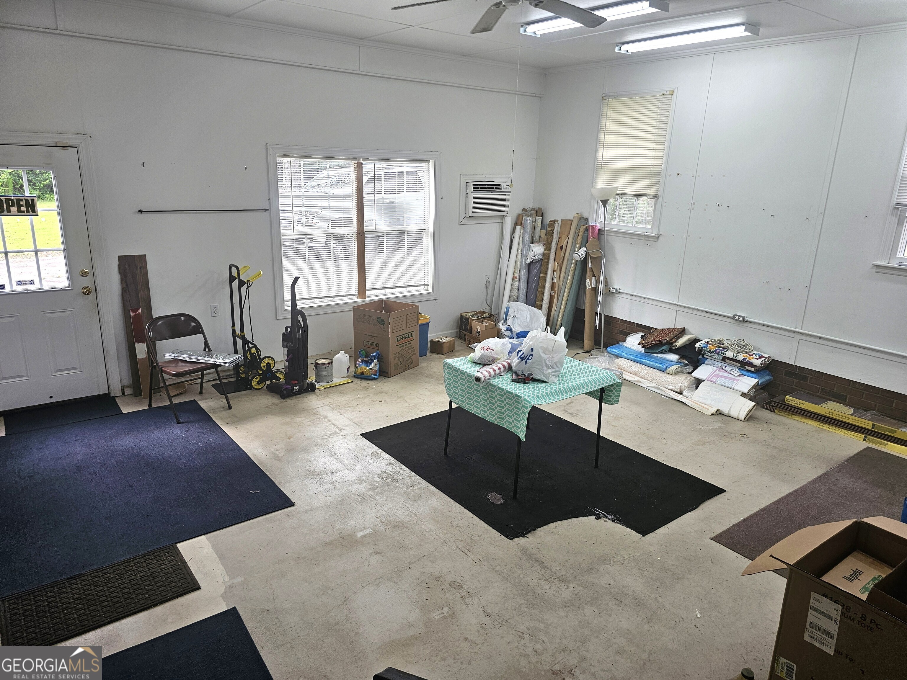 613 Old Macon Road Dublin, GA 31021 - Photo 15 of 17 a living room with furniture window and wooden floor