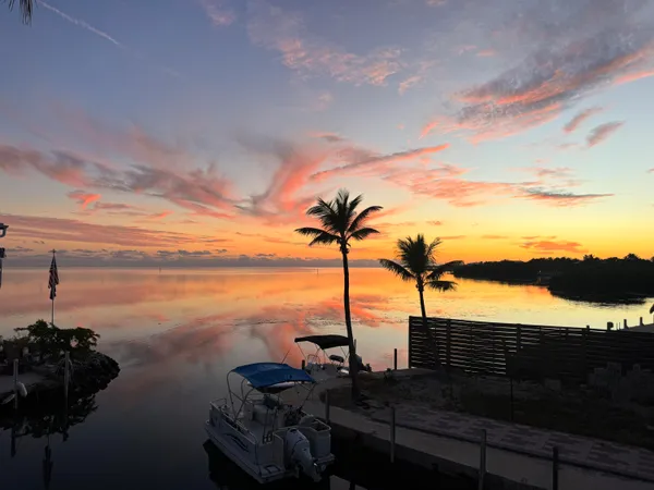 a view of a lake next to a ocean view