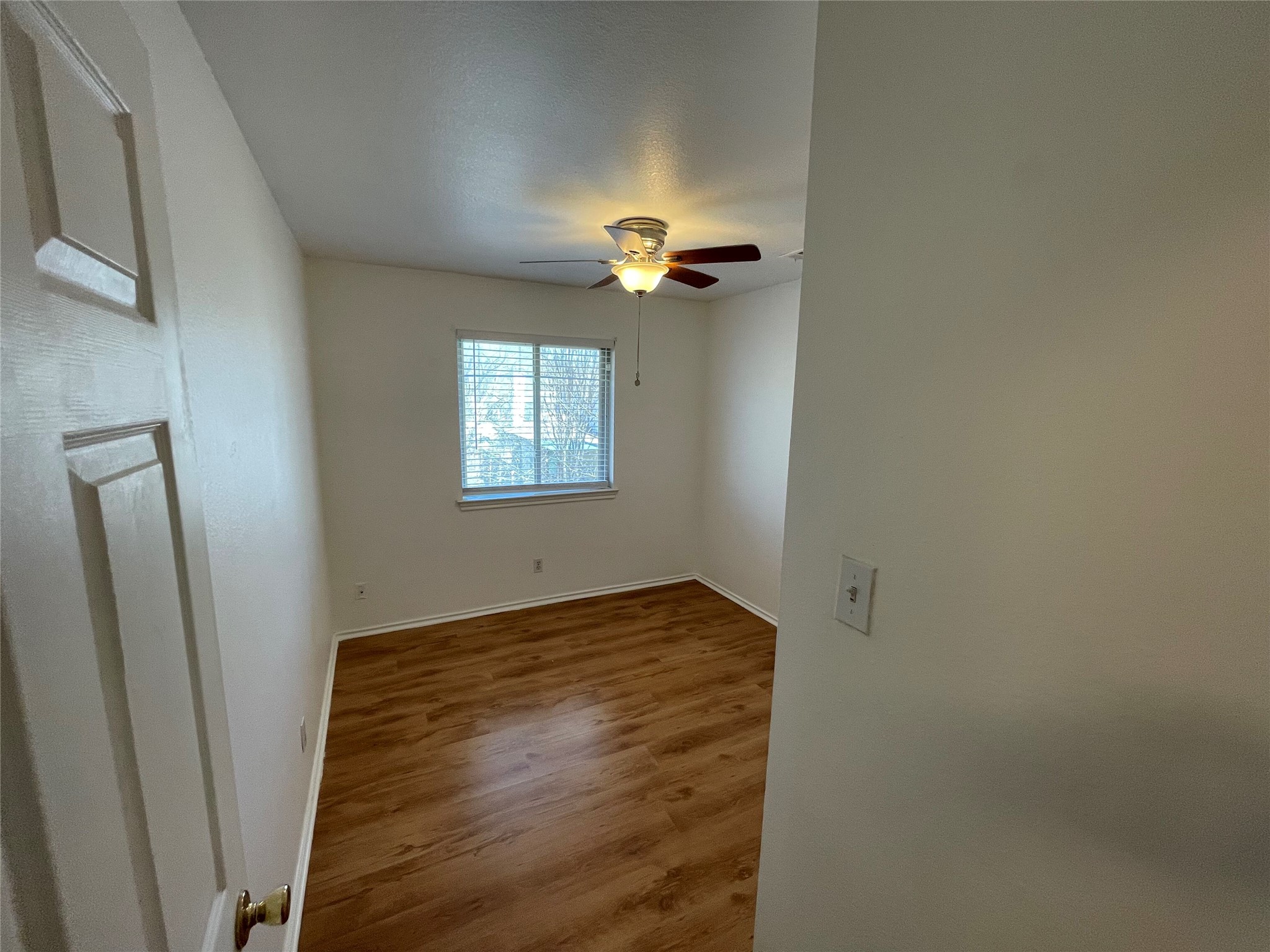 8010 Willet Trail, Unit A Austin, TX 78745 - Photo 20 of 31 a view of an empty room with a window