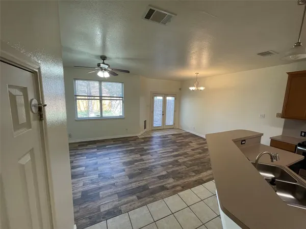 a view of a livingroom with furniture and window