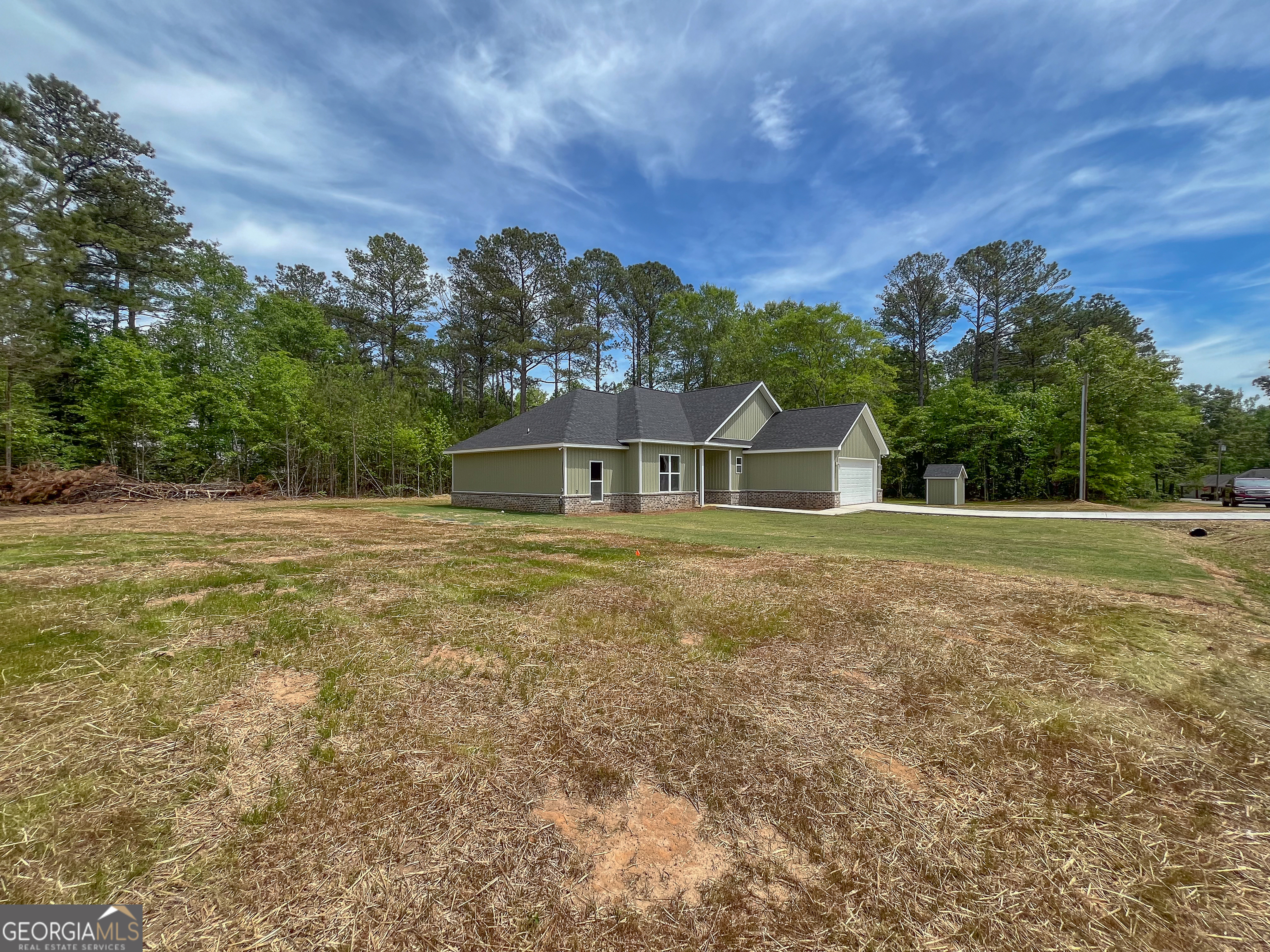 711 Flanders Lane Dublin, GA 31021 - Photo 41 of 49 a front view of a house with a yard