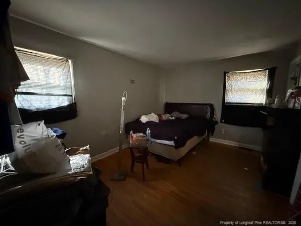 a bathroom with a sink toilet and mirror
