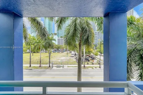 a view of a porch and a yard