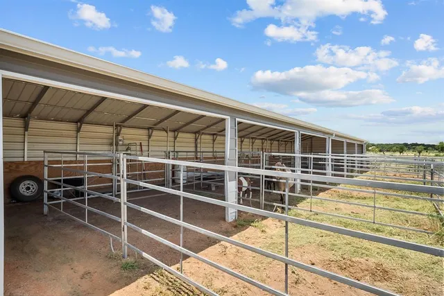 a view of a balcony with a ceiling fan