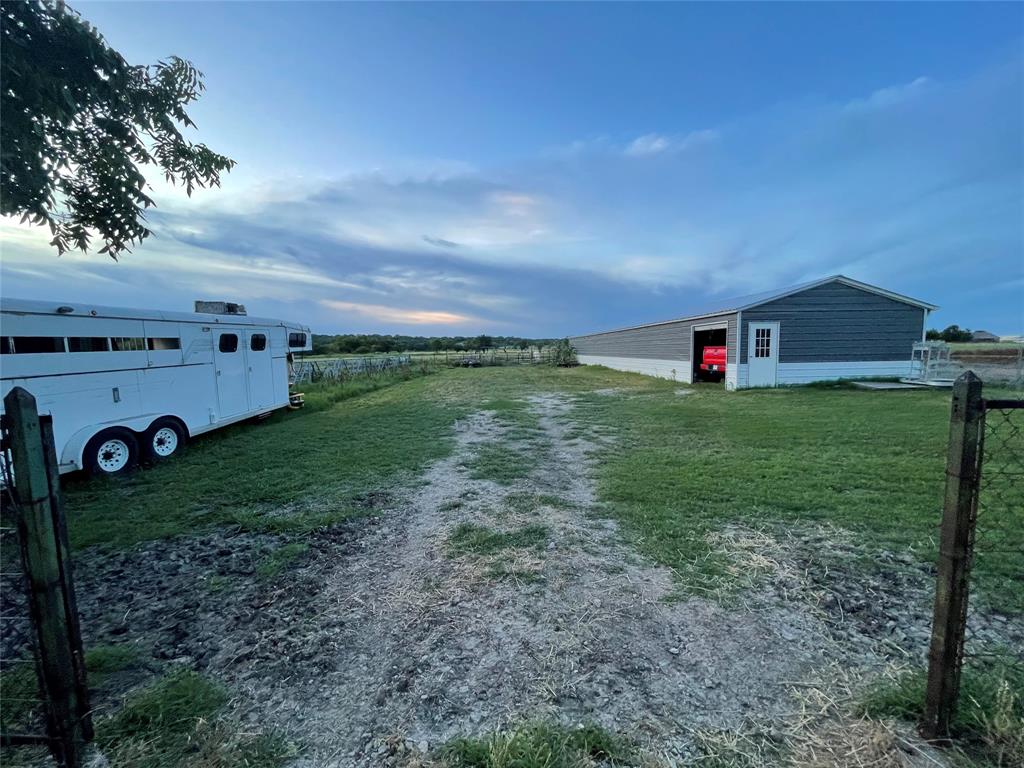 87 Ledbetter Road Mineral Wells, TX 76067 - Photo 20 of 22 a view of a backyard