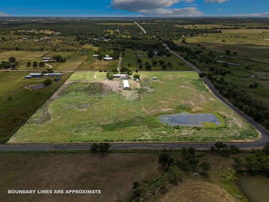 87 Ledbetter Road Mineral Wells, TX 76067 - Photo 2 of 22 a view of a lake