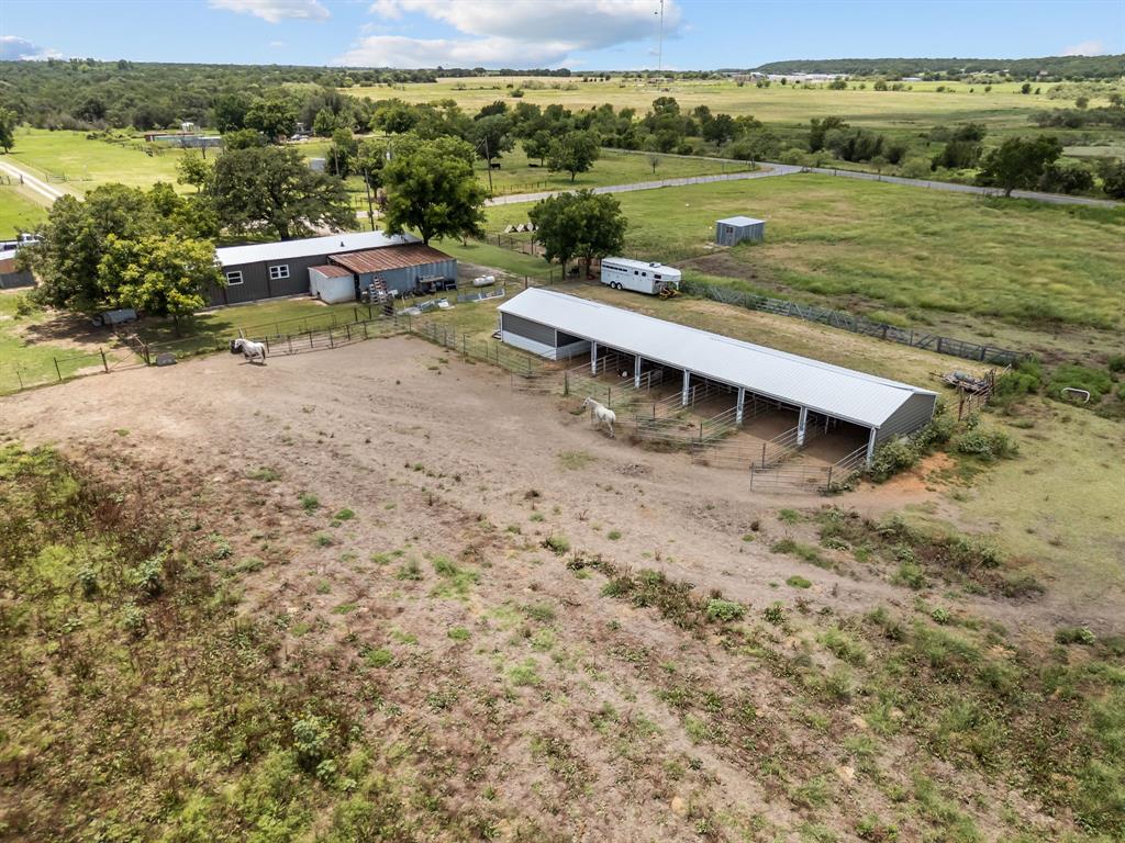 87 Ledbetter Road Mineral Wells, TX 76067 - Photo 5 of 22 a view of a lake with a mountain
