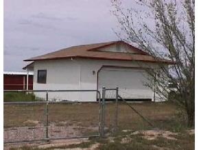 3527 North Reed Road Chino Valley, AZ 86323 - Photo 3 of 3 a view of a house with a yard