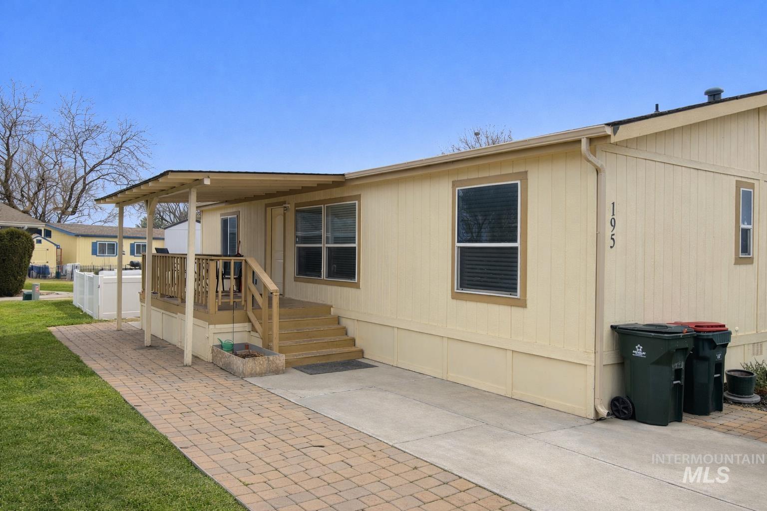 Back of house featuring a deck