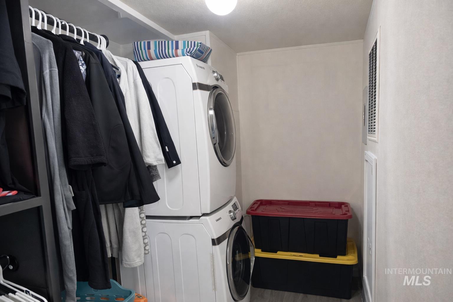 700 East Fairview Avenue, Unit 195 Meridian, ID 83642 - Photo 13 of 19 Laundry room with stacked washer / drying machine