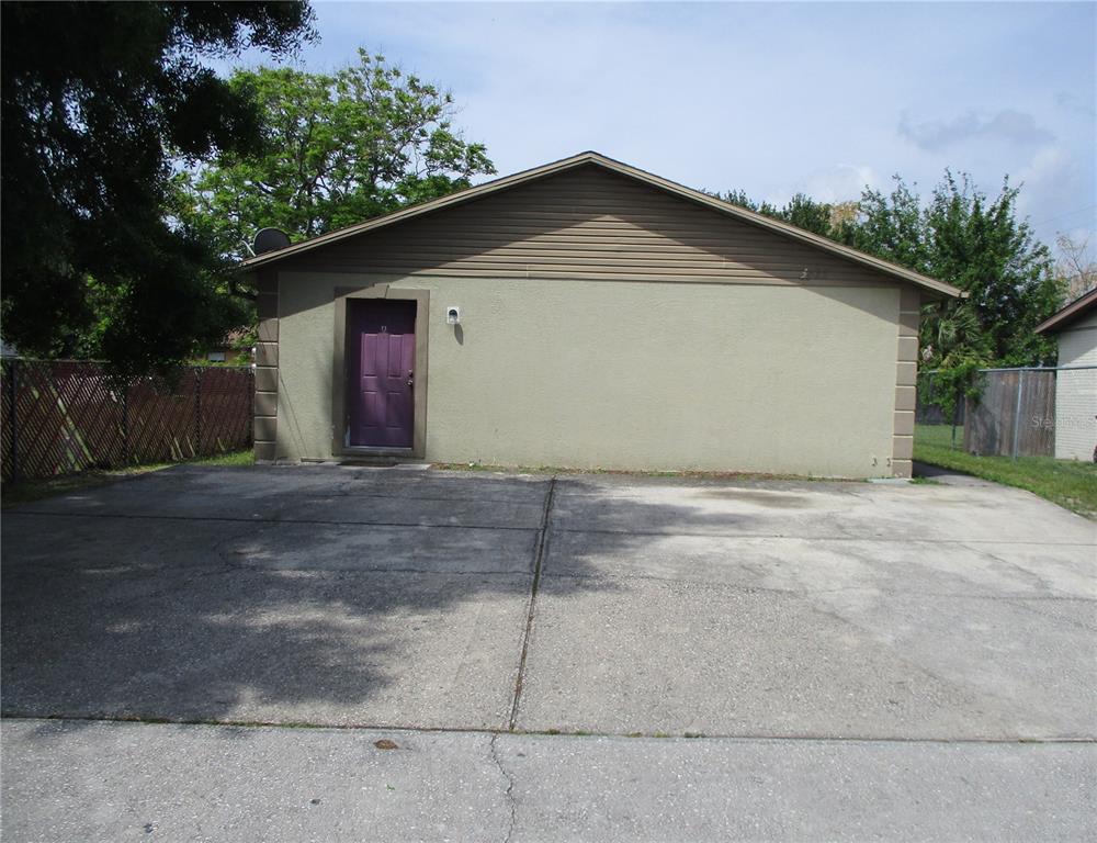 a front view of a house with a garage
