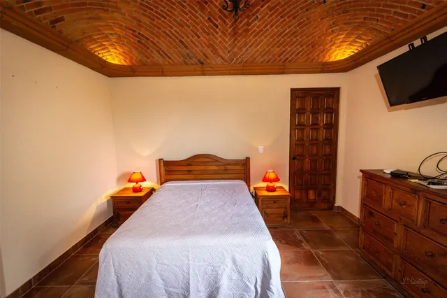 a kitchen with stainless steel appliances granite countertop a sink a microwave cabinets and wooden floor