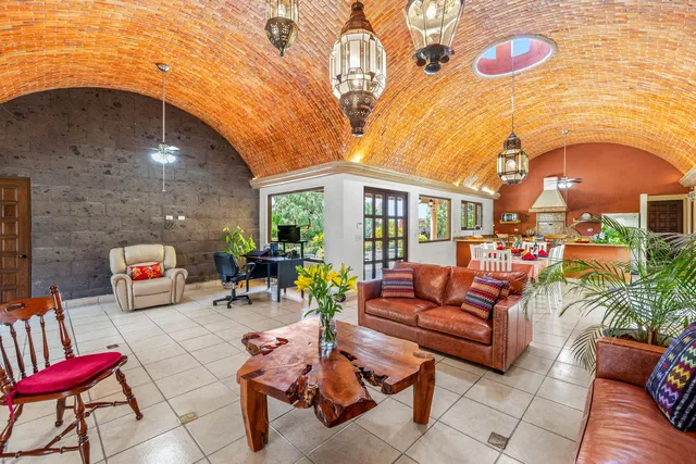 a outdoor space with patio the couches and a potted plant