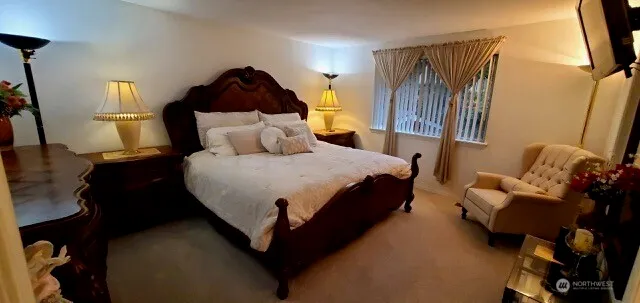 a bed room with a bed and a couch