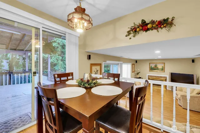 a view of a dining room with furniture window and outside view