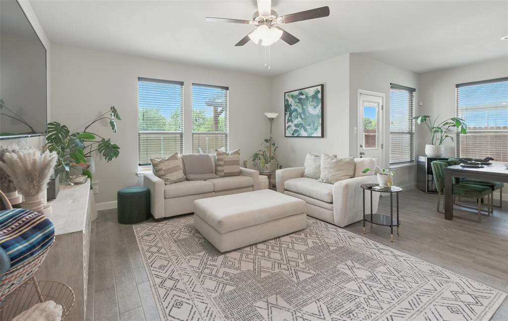 712 Finchley Drive Fort Worth, TX 76247 - Photo 14 of 37 a living room with furniture and a large window