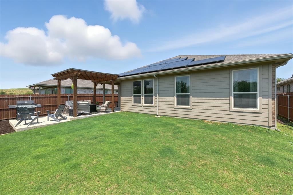 712 Finchley Drive Fort Worth, TX 76247 - Photo 19 of 37 a house view with a garden space