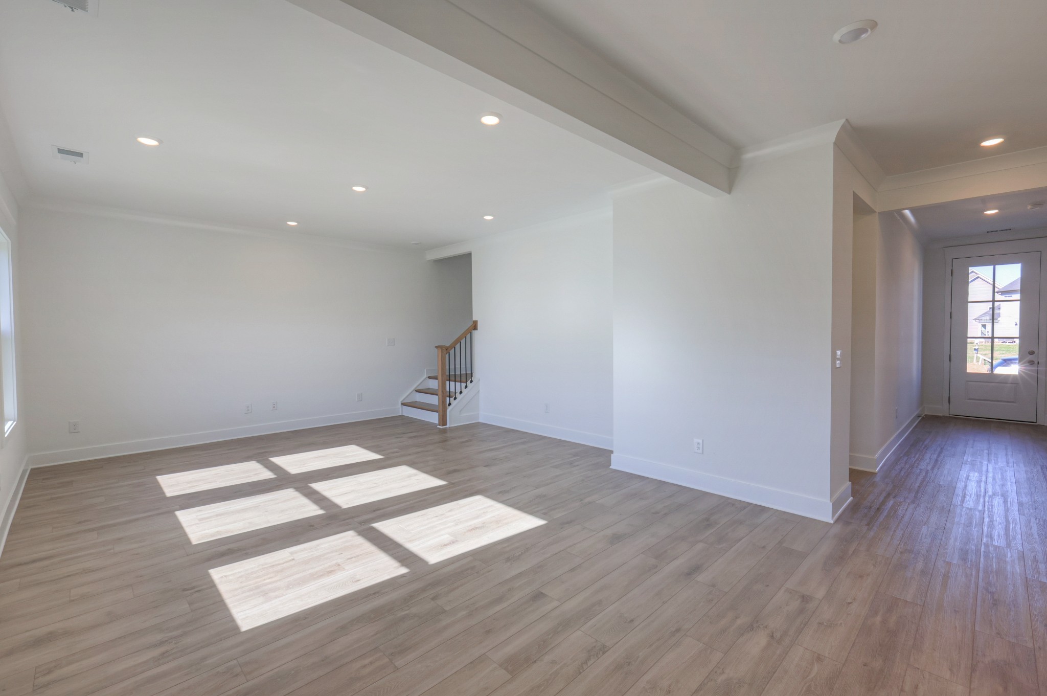 411 Duchess Boulevard, Unit A Gallatin, TN 37066 - Photo 12 of 26 an empty room with wooden floor and windows