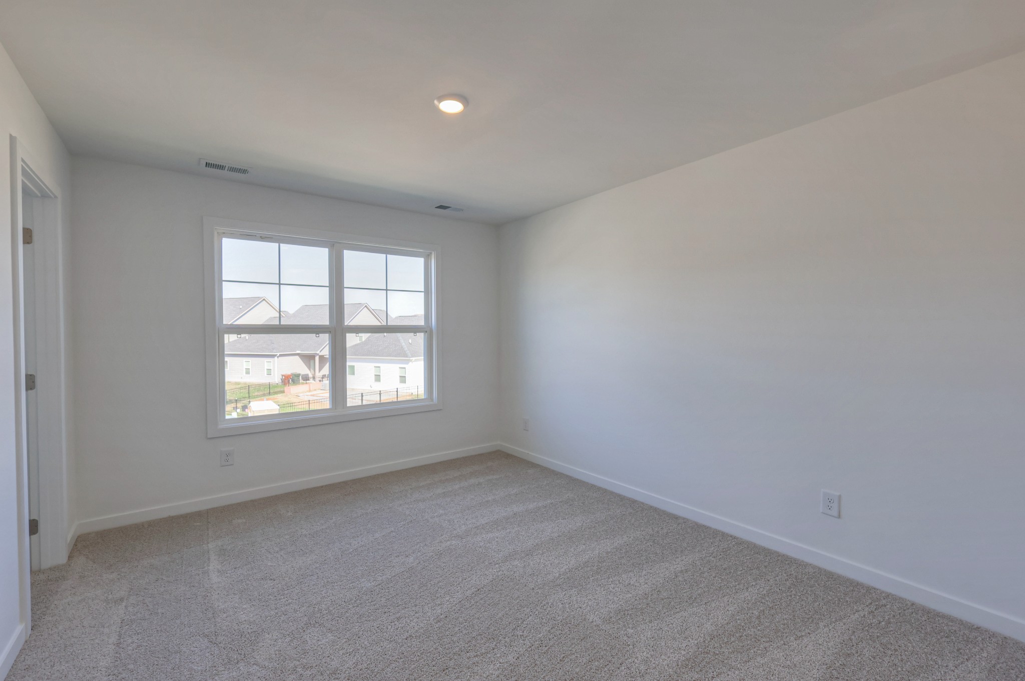 411 Duchess Boulevard, Unit A Gallatin, TN 37066 - Photo 19 of 26 an empty room with a window