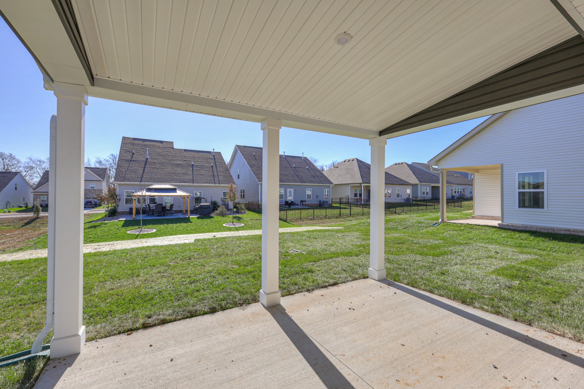 411 Duchess Boulevard, Unit A Gallatin, TN 37066 - Photo 24 of 26 a view of a house with a big yard and a large window