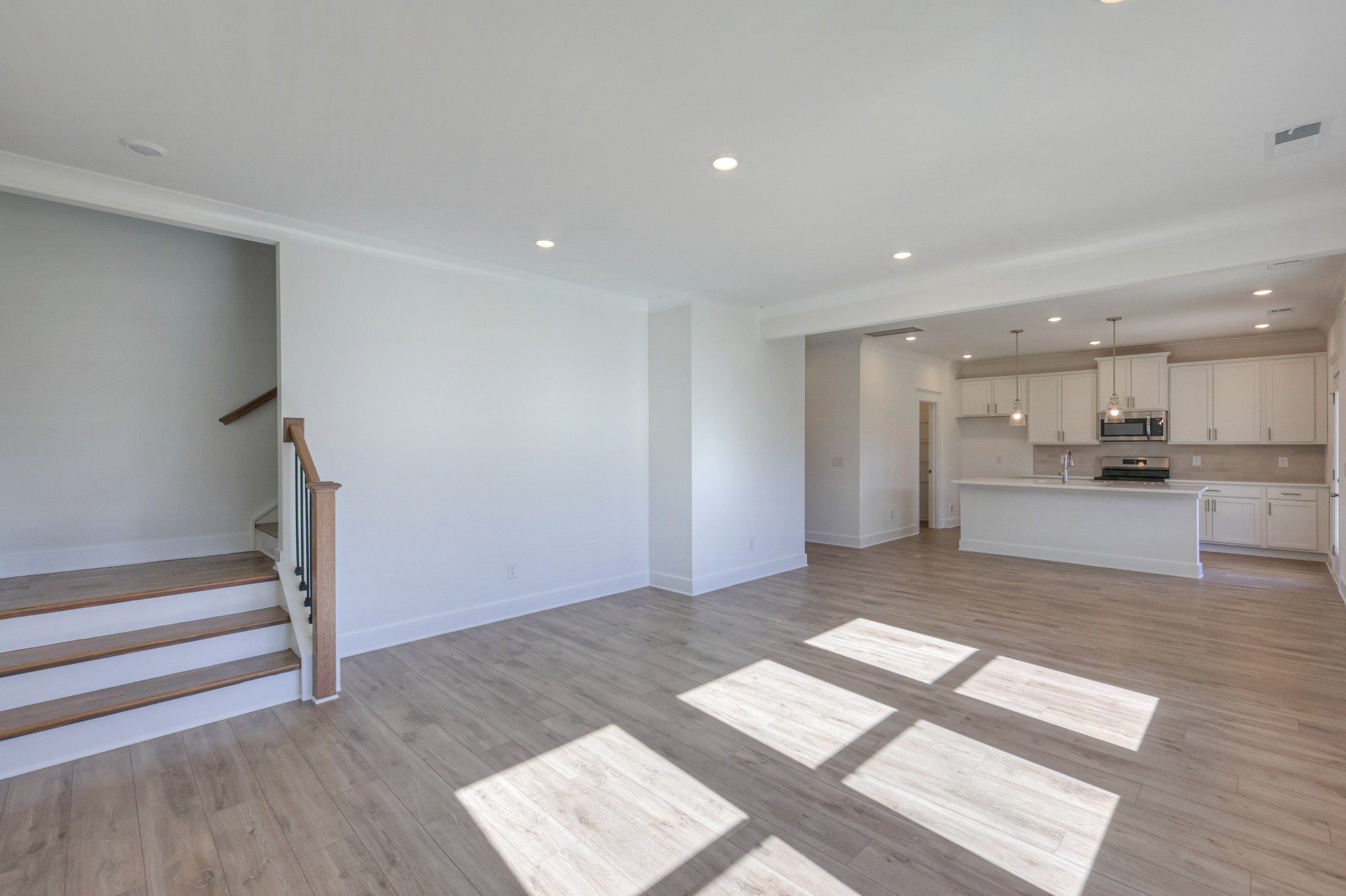 411 Duchess Boulevard, Unit A Gallatin, TN 37066 - Photo 4 of 26 a view of kitchen with wooden floor and electronic appliances