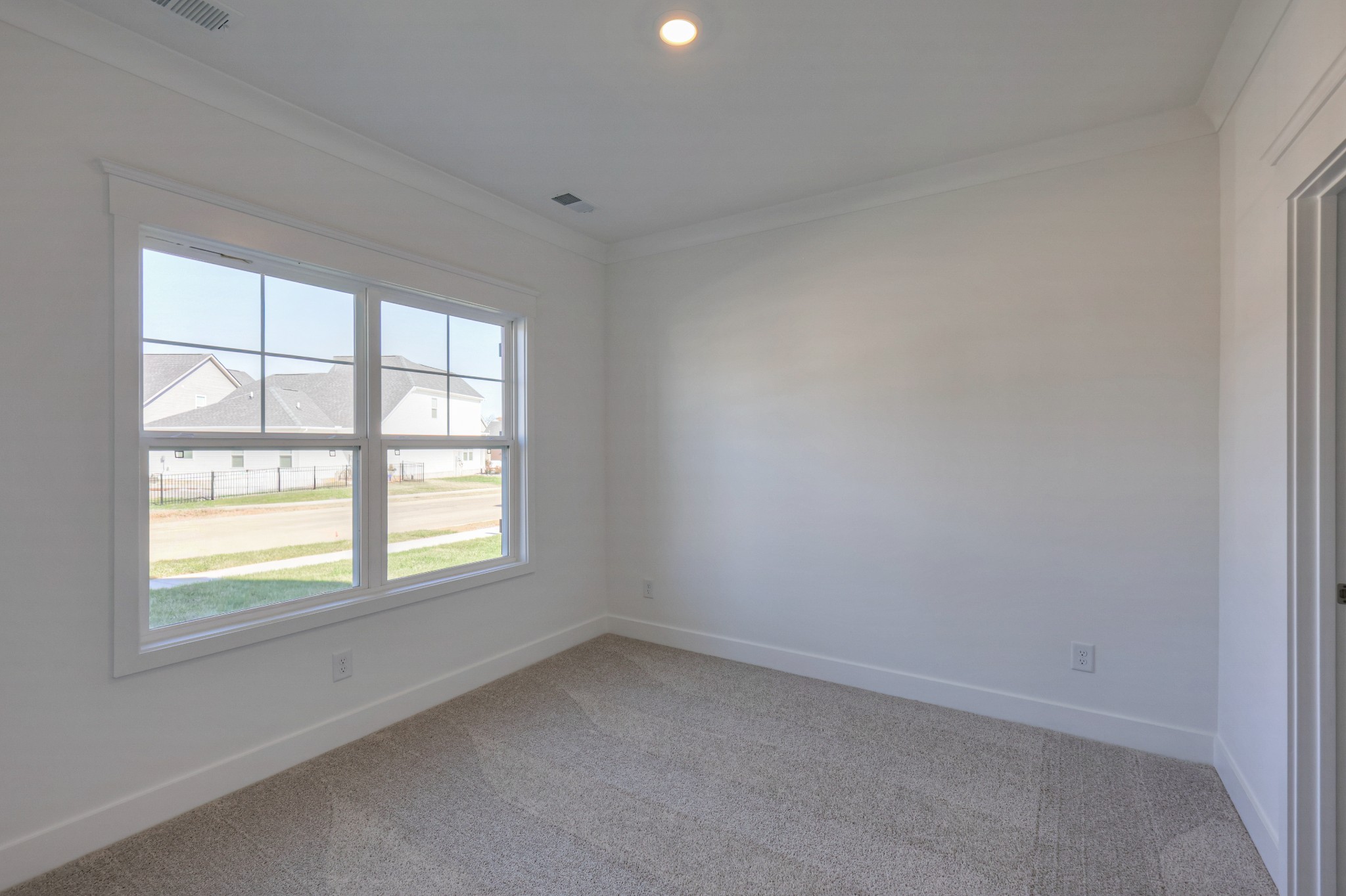 411 Duchess Boulevard, Unit A Gallatin, TN 37066 - Photo 9 of 26 an empty room with a window