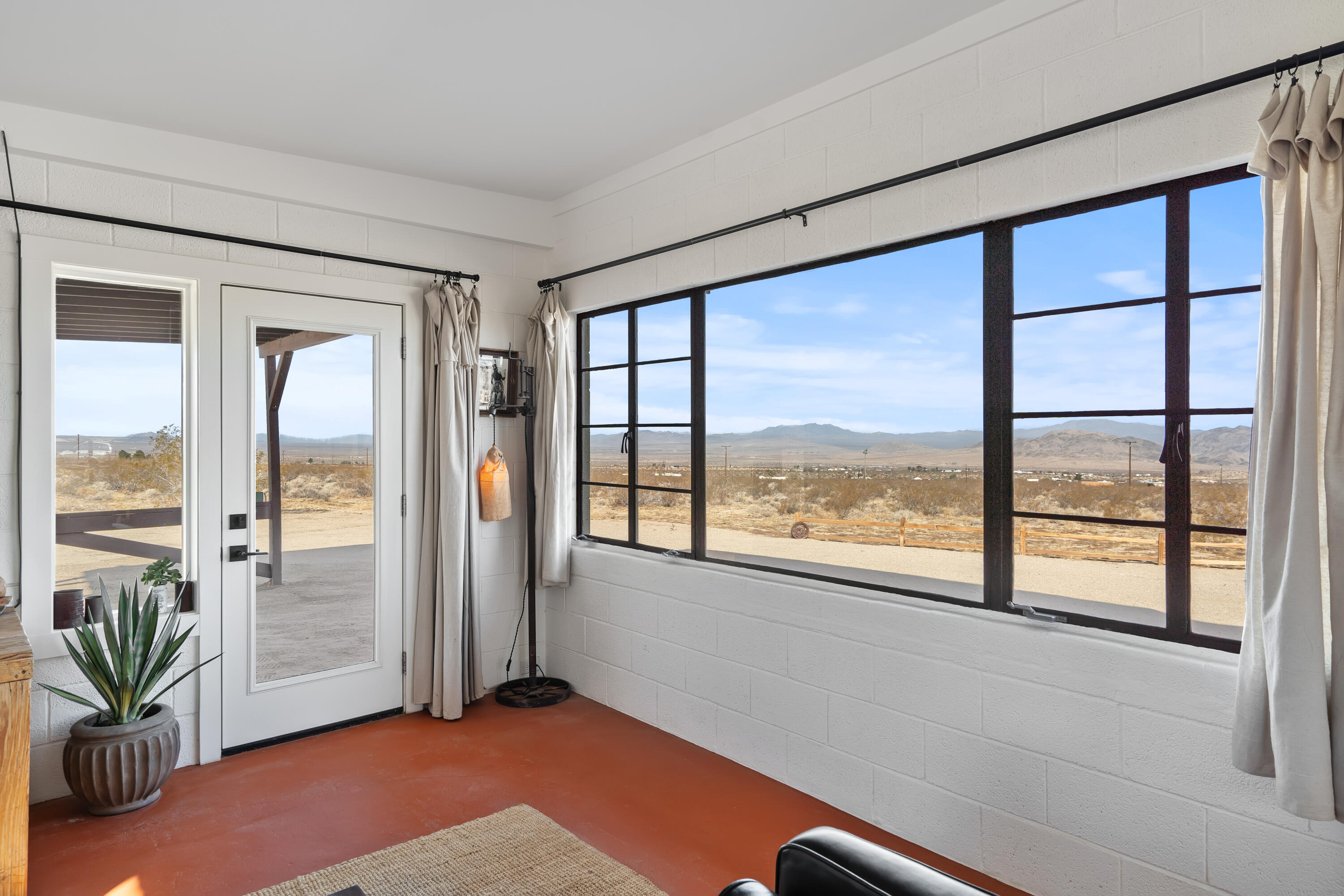 52079 Ocotillo Road Johnson Valley, CA 92285 - Photo 11 of 40 wooden floor in an empty room with a window