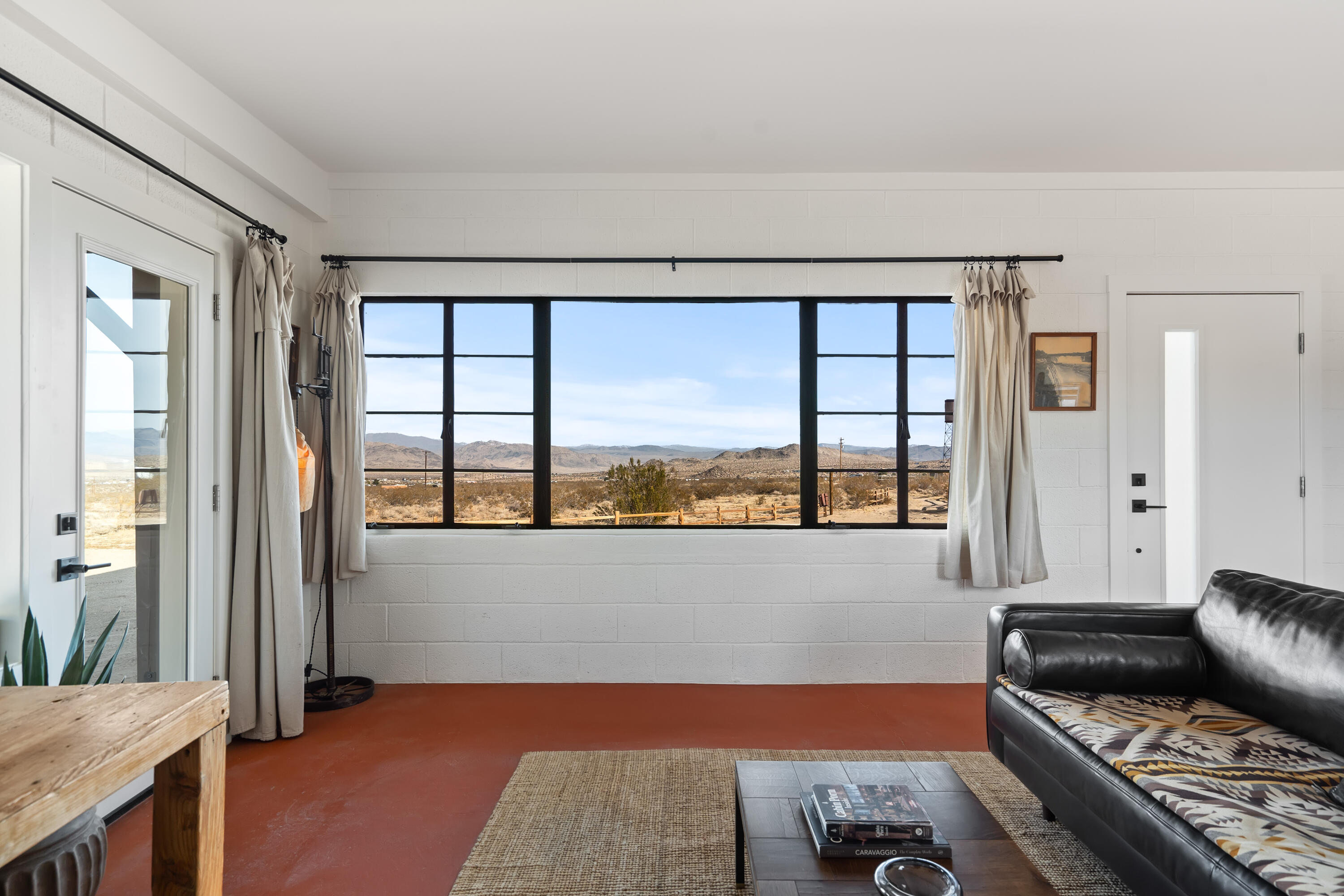 52079 Ocotillo Road Johnson Valley, CA 92285 - Photo 12 of 40 a living room with furniture and a window