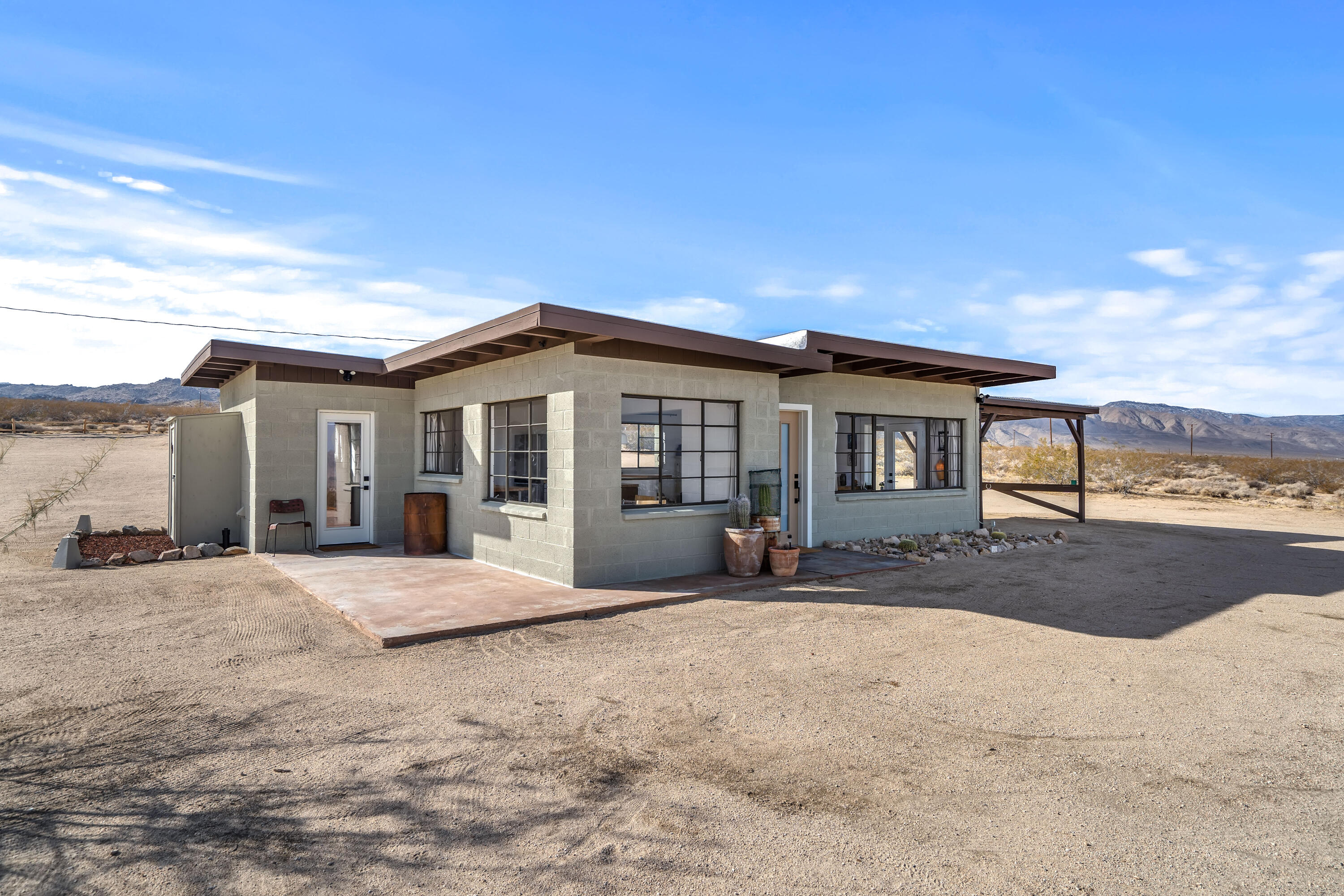 52079 Ocotillo Road Johnson Valley, CA 92285 - Photo 3 of 40 a front view of a house with a patio