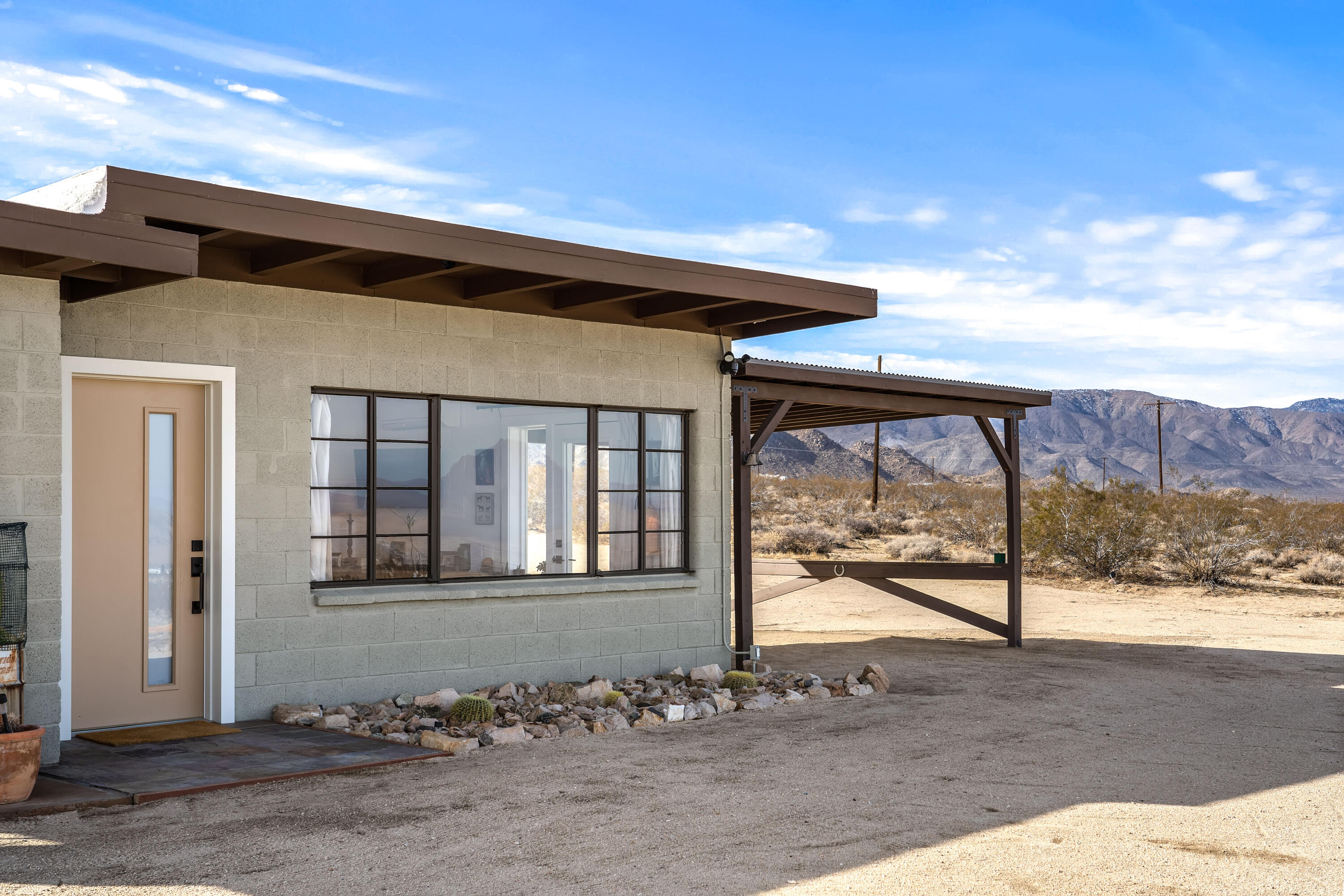 52079 Ocotillo Road Johnson Valley, CA 92285 - Photo 32 of 40 a front view of a house with a yard