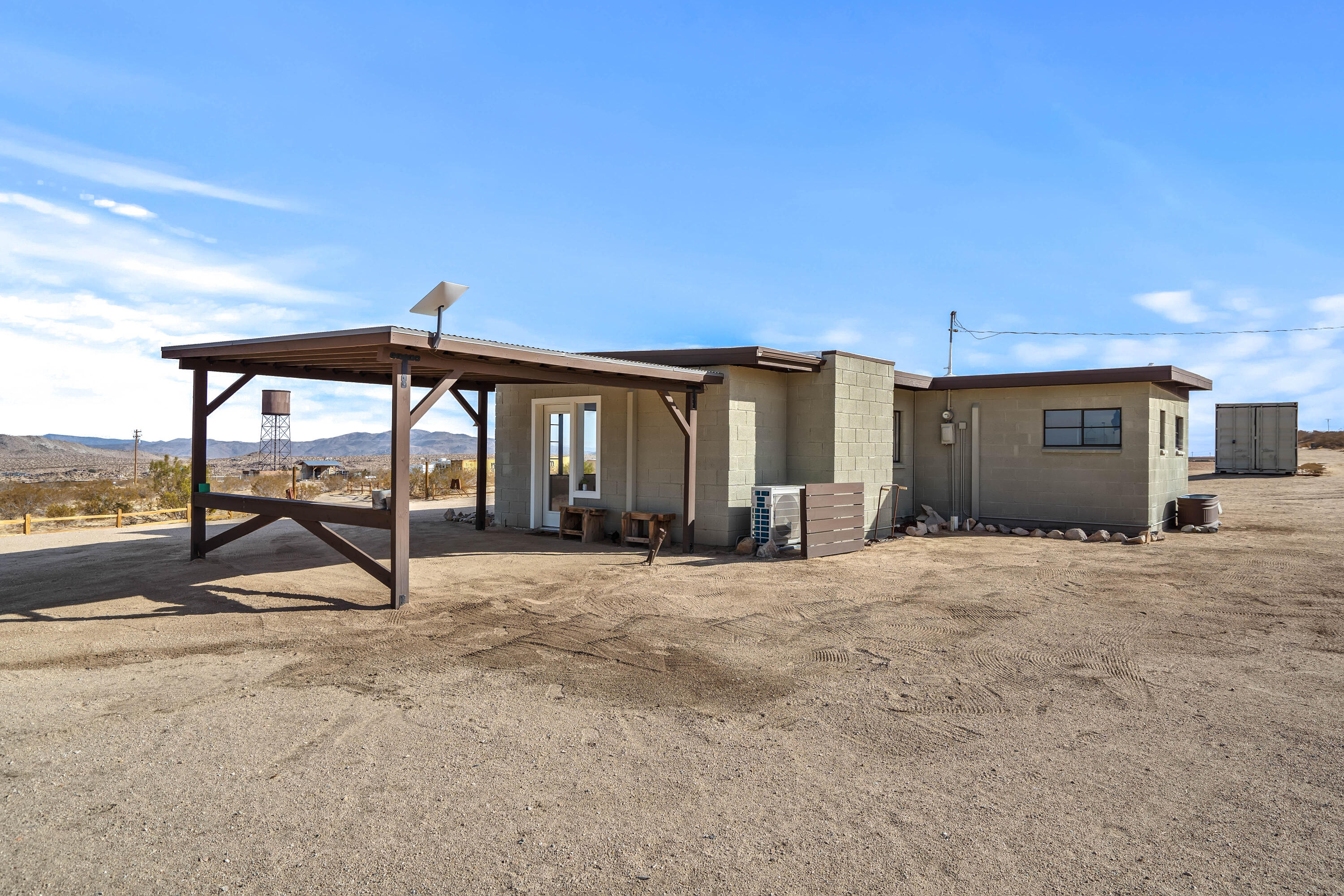 52079 Ocotillo Road Johnson Valley, CA 92285 - Photo 36 of 40 a view of a house with outdoor space and sitting area