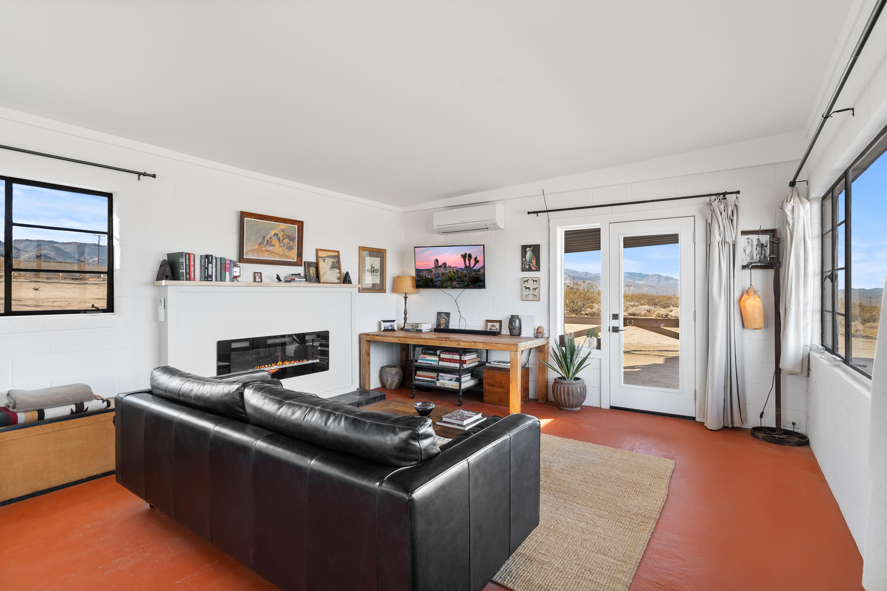 52079 Ocotillo Road Johnson Valley, CA 92285 - Photo 4 of 40 a living room with furniture and a fireplace
