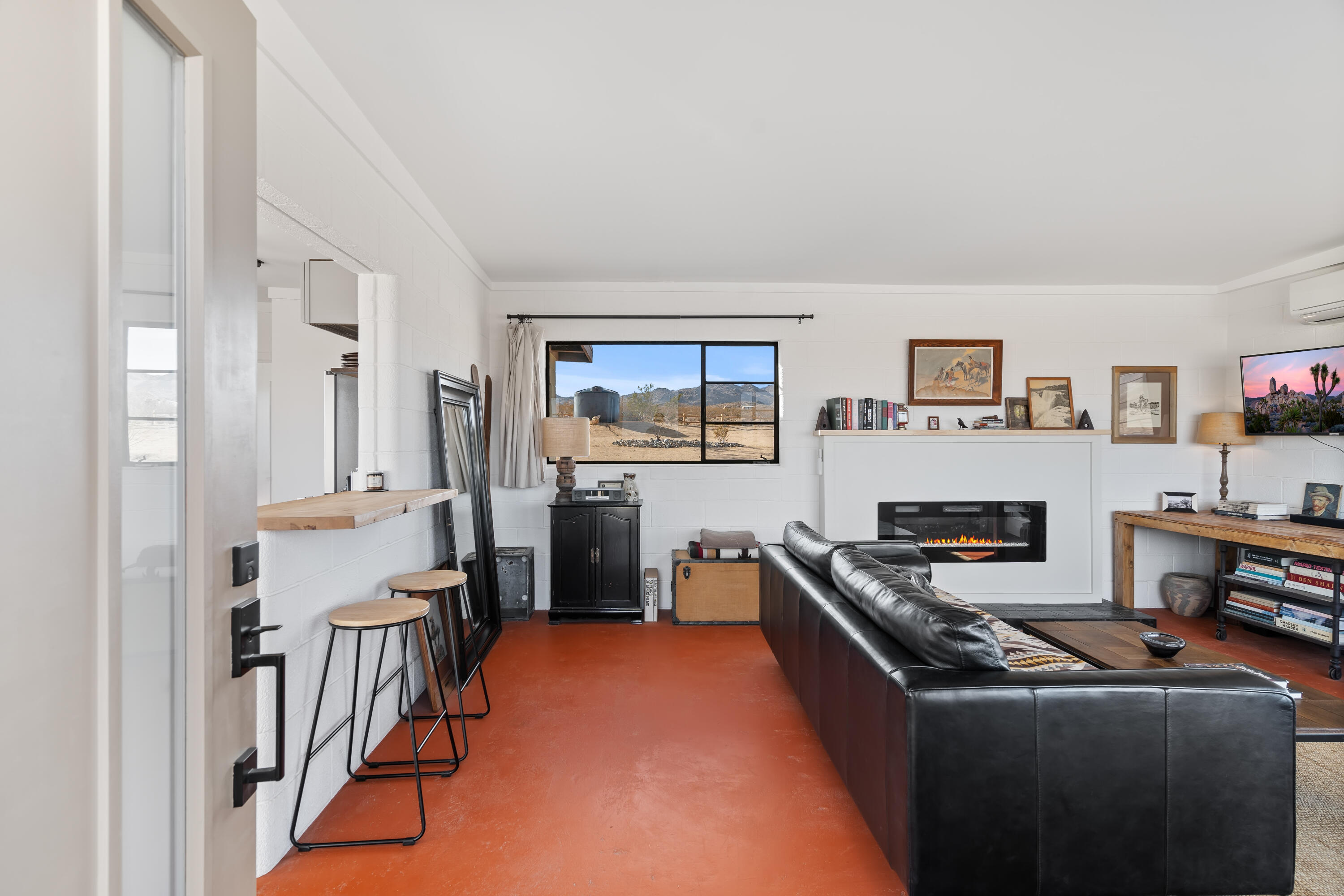 52079 Ocotillo Road Johnson Valley, CA 92285 - Photo 6 of 40 a kitchen with stainless steel appliances granite countertop a stove top oven a sink a refrigerator and white cabinets