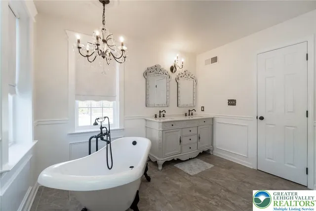 a very nice looking dining room with furniture