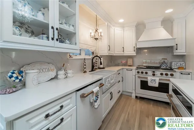 a living room with furniture fireplace and flat screen tv