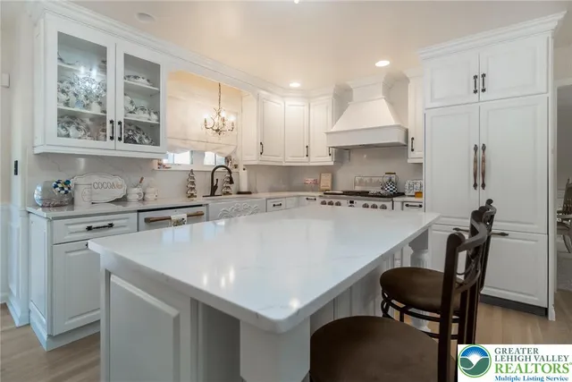 a bedroom with a bed window and flat screen tv