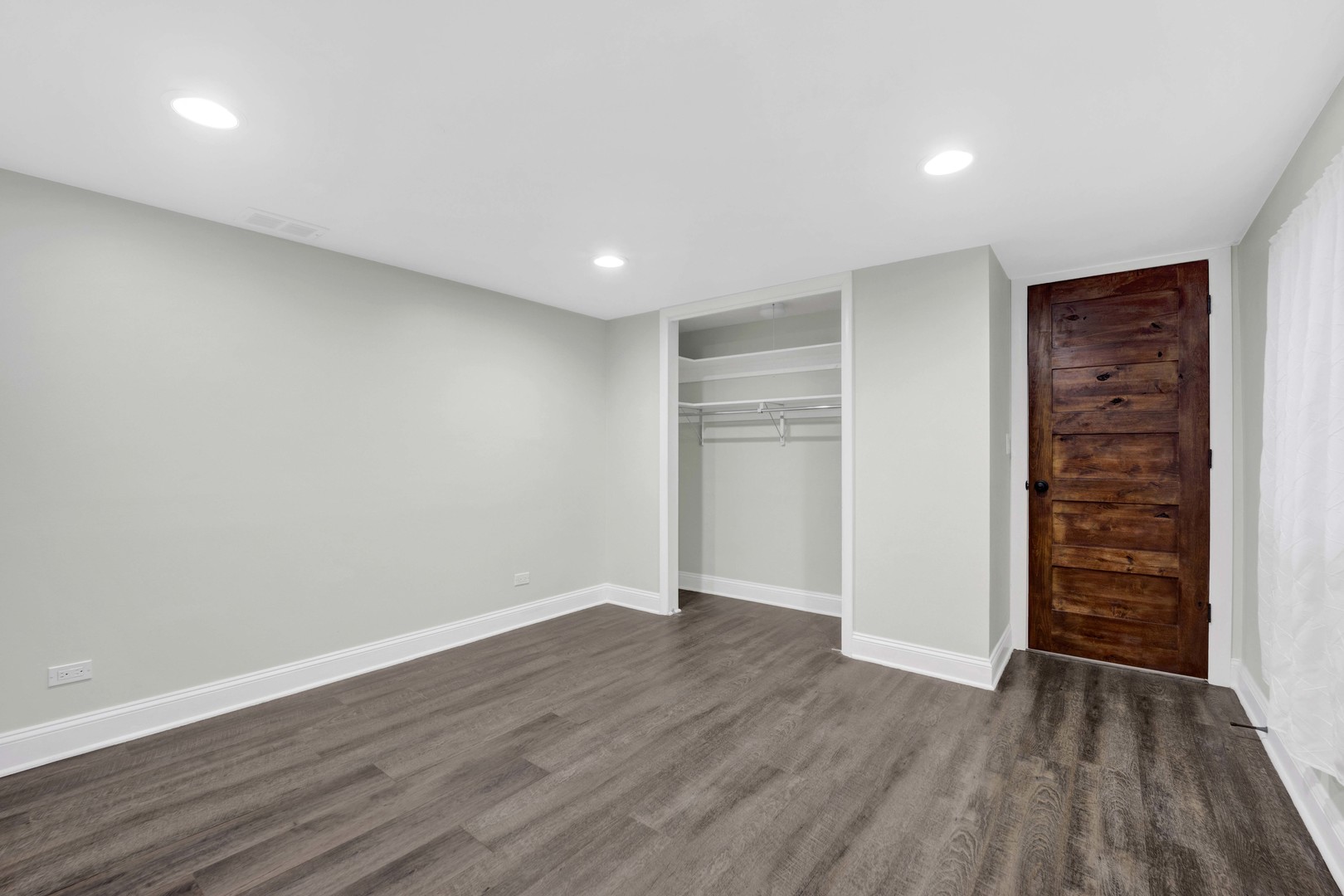 332 South River Road Naperville, IL 60540 - Photo 36 of 41 a view of an empty room with wooden floor and closet