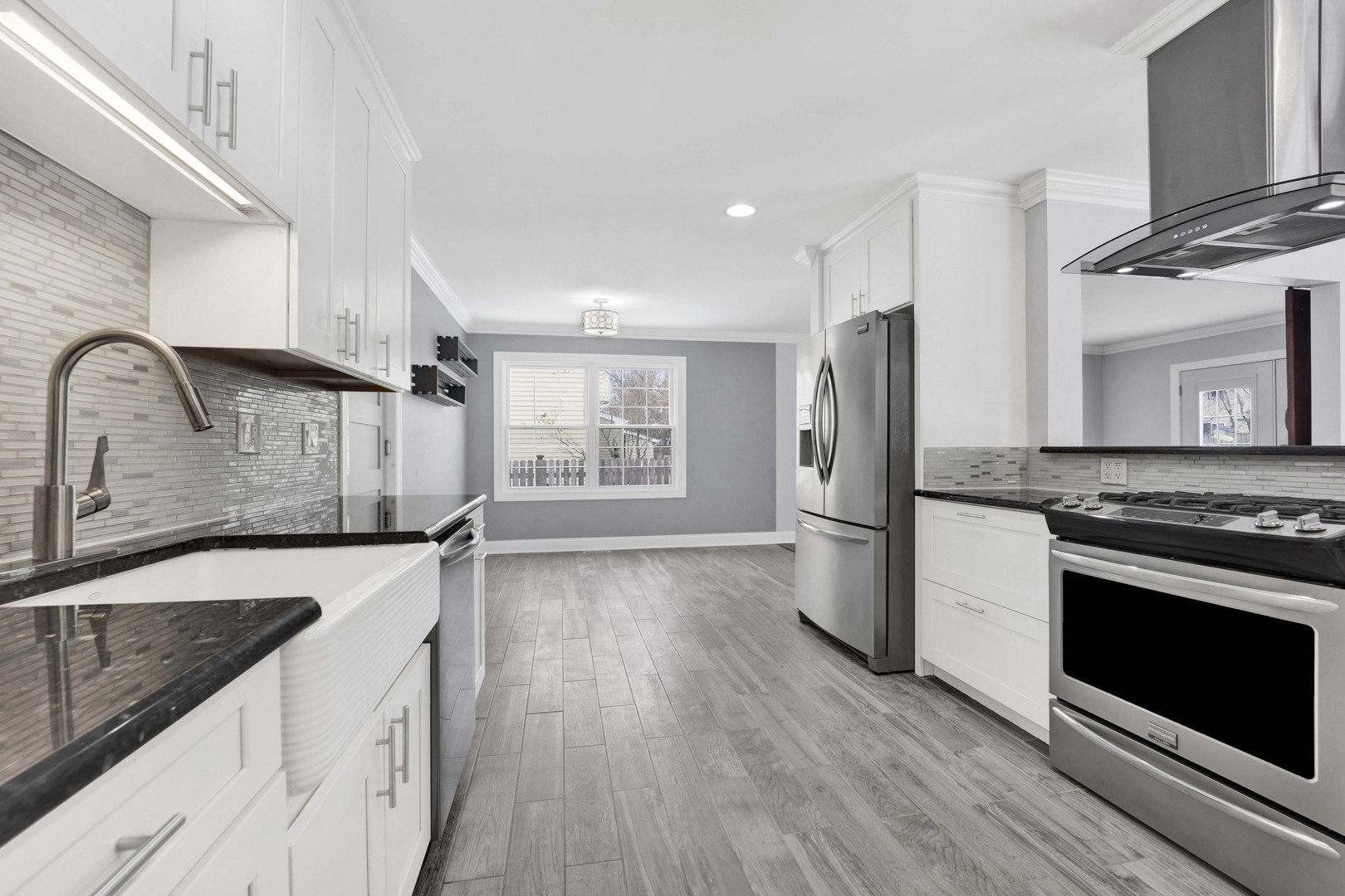332 South River Road Naperville, IL 60540 - Photo 5 of 41 a kitchen with a sink stove and refrigerator