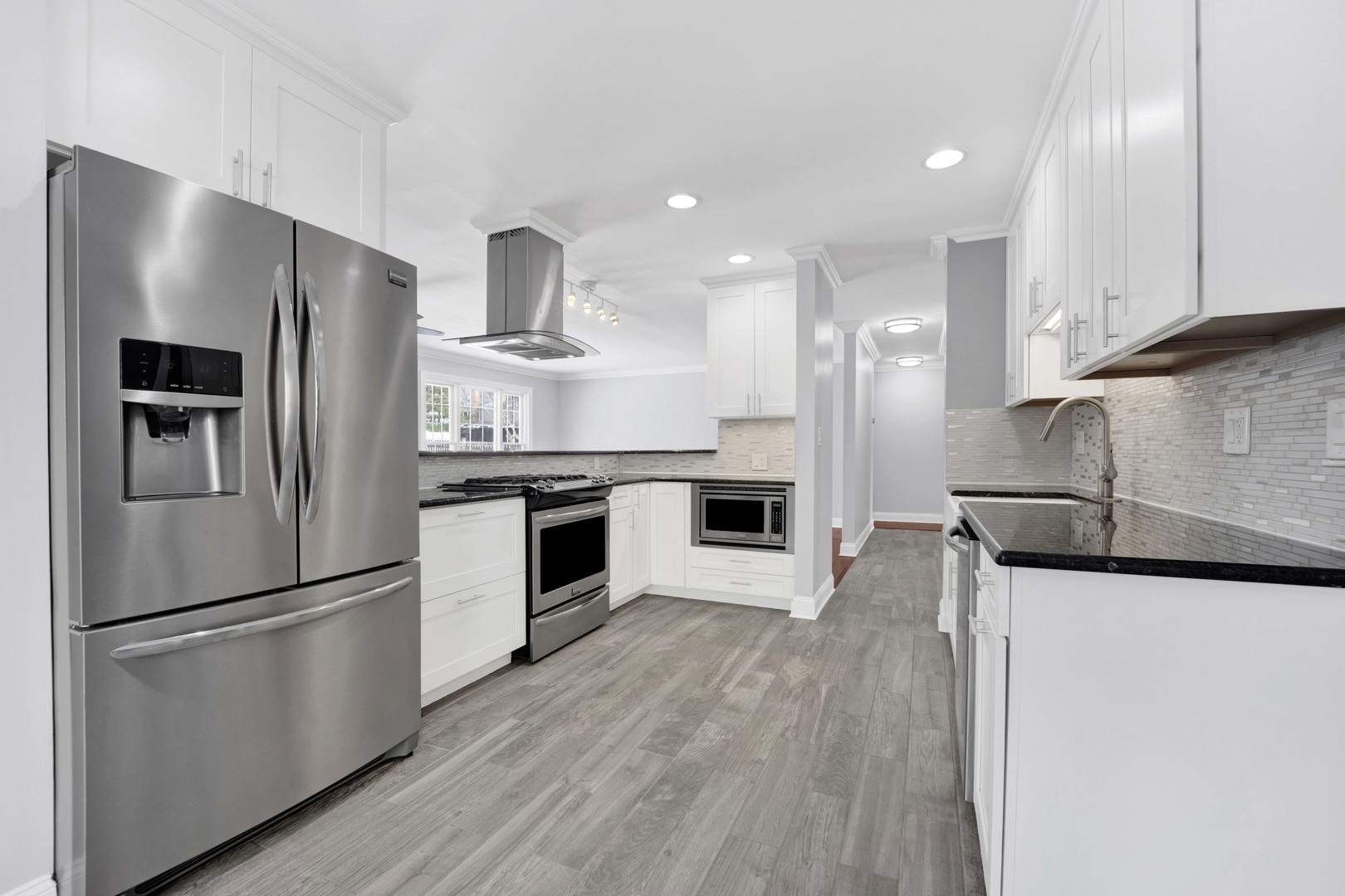 332 South River Road Naperville, IL 60540 - Photo 7 of 41 a kitchen with stainless steel appliances granite countertop a refrigerator a stove and a sink