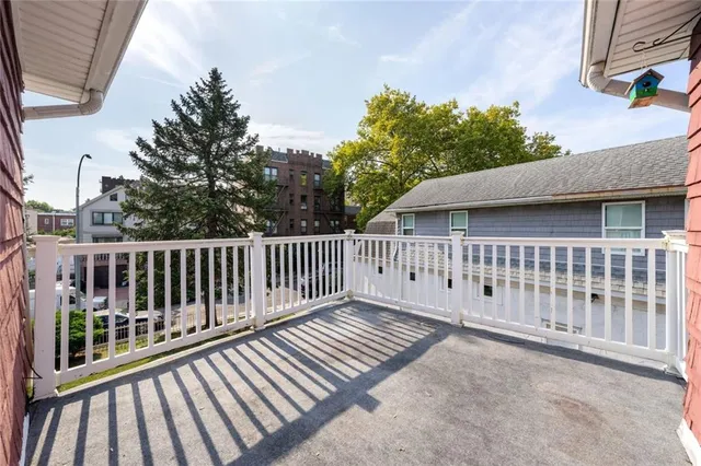 a view of a wooden fence