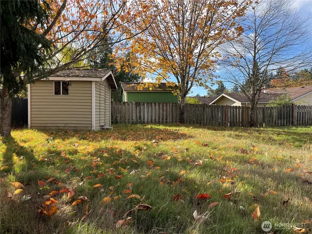 a house with trees in front of it