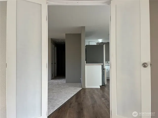 a view of a hallway with an empty space