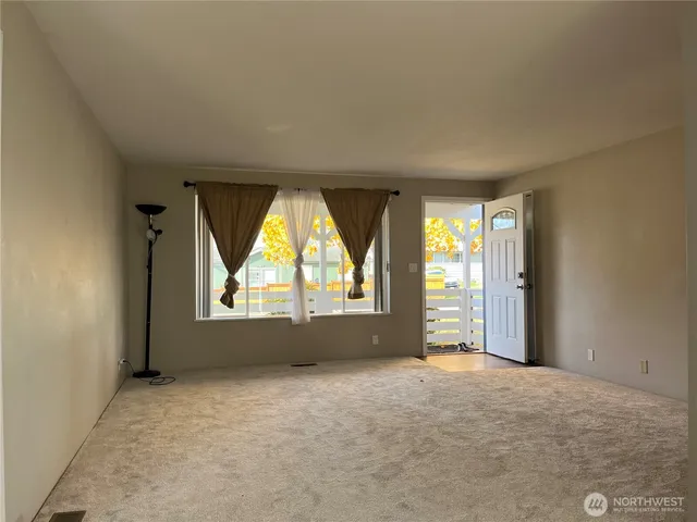 an empty room with windows