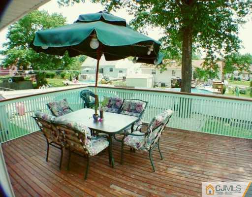 35 Mercer Road Old Bridge, NJ 08857 - Photo 8 of 8 a view of balcony with furniture and outdoor seating
