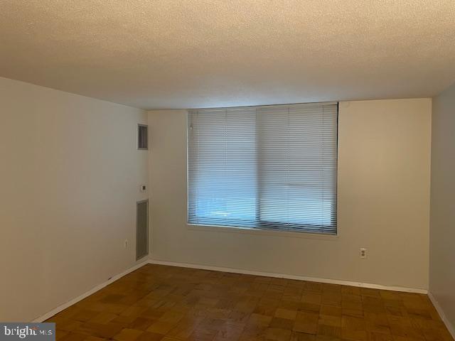 1301 20th Street Northwest, Unit 316 Washington, DC 20036 - Photo 8 of 9 an empty room with a window