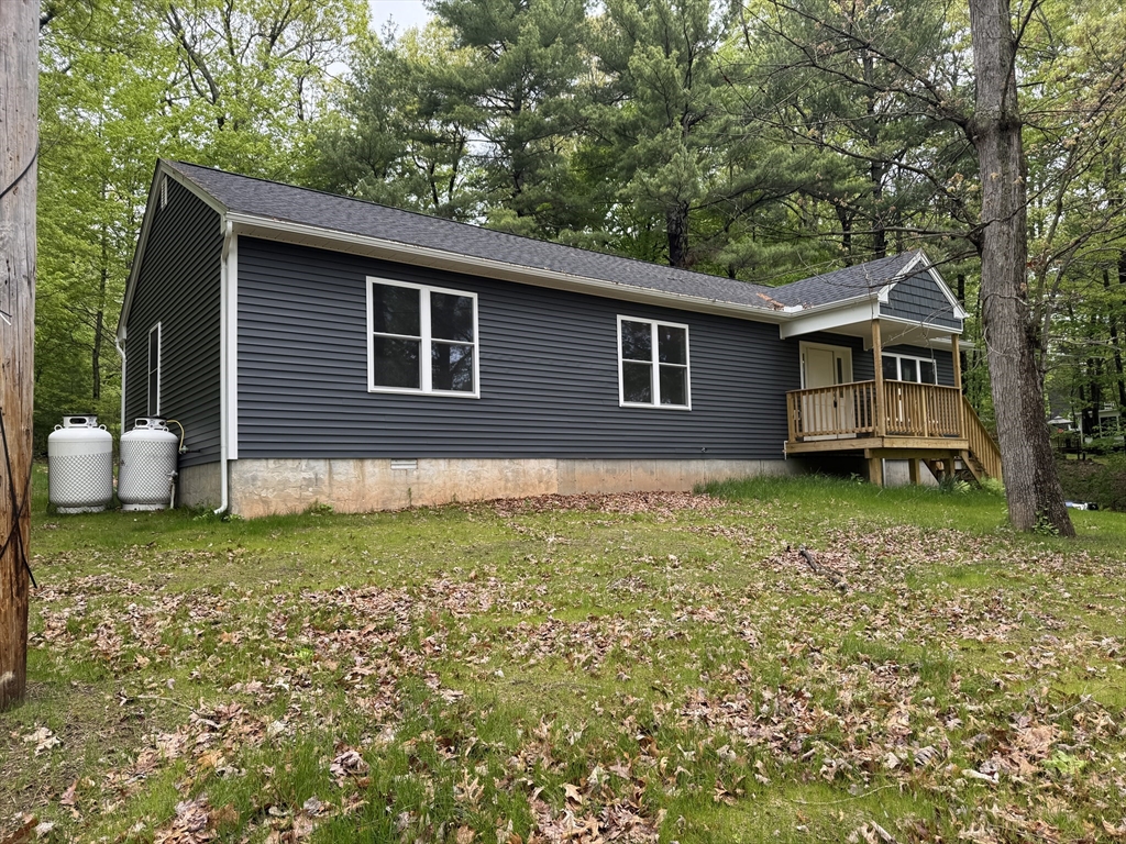 132 Kibbe Road East Longmeadow, MA 01028 - Photo 4 of 32 a backyard of a house with seating space