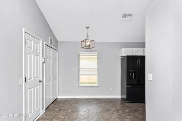 a view of an entryway with a window