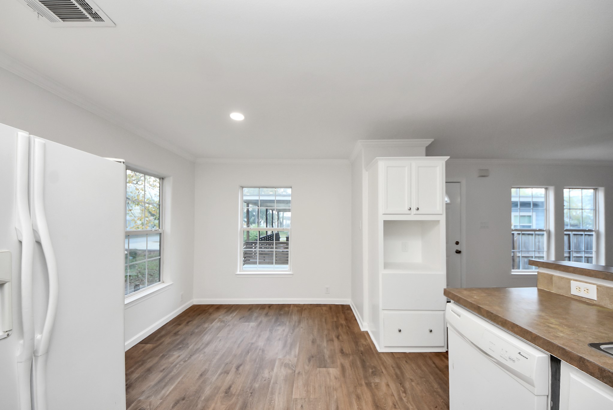 6526 Carver Road, Unit A Houston, TX 77091 - Photo 15 of 31 an empty room with windows and entrance