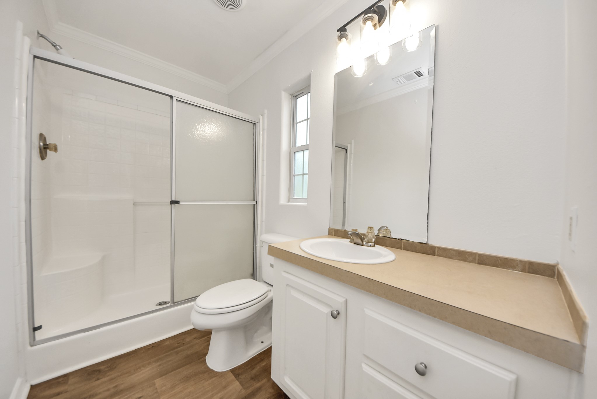 6526 Carver Road, Unit A Houston, TX 77091 - Photo 27 of 31 a bathroom with a sink a toilet and shower