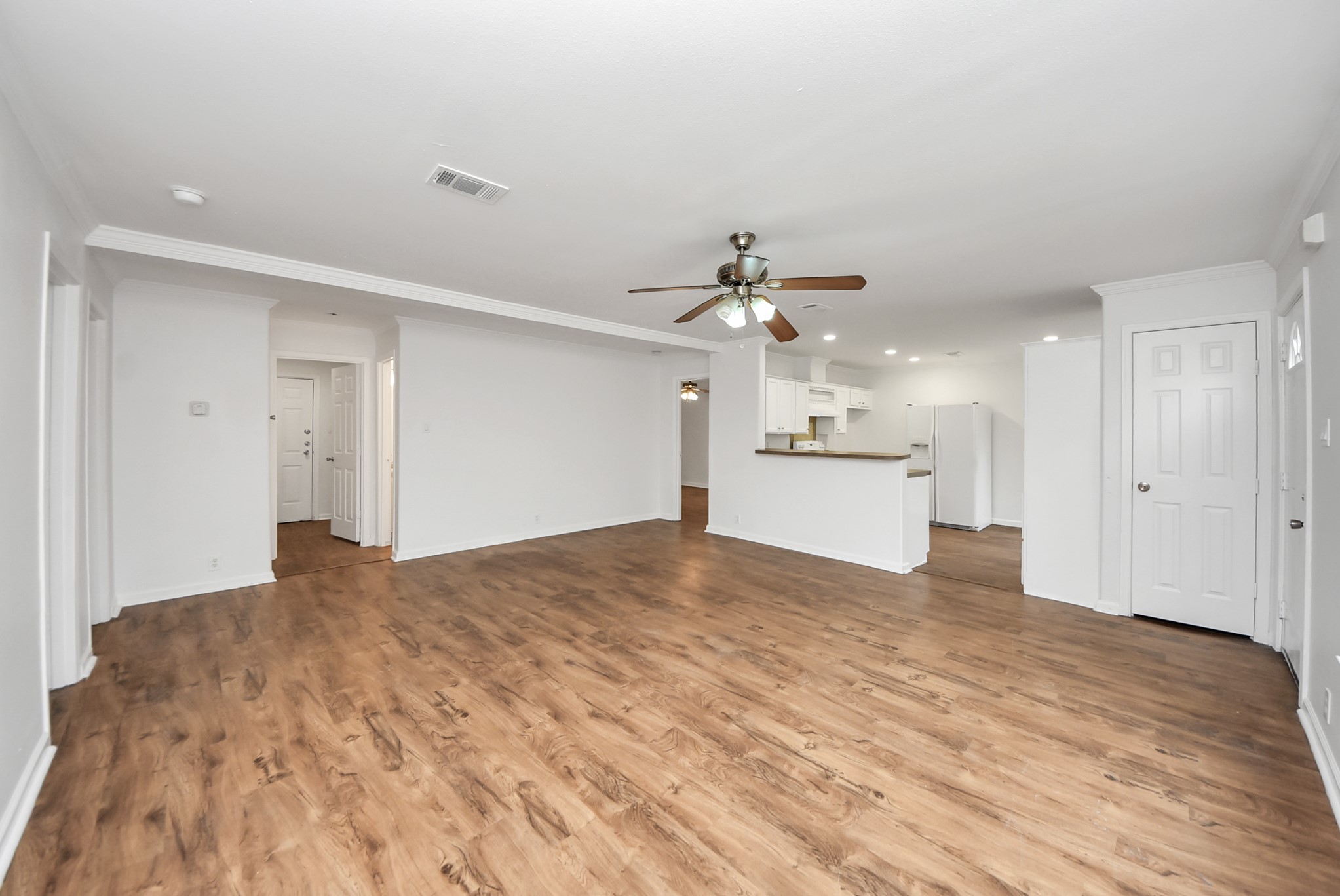 6526 Carver Road, Unit A Houston, TX 77091 - Photo 5 of 31 a view of a kitchen with a sink and refrigerator
